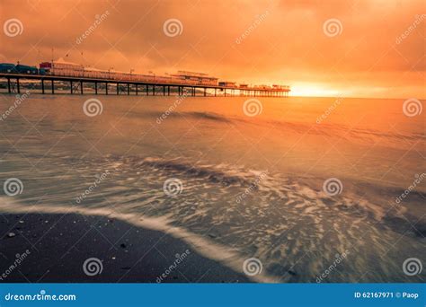 Paignton Pier at sunset stock image. Image of landscape - 62167971