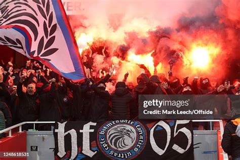 Crystal Palace supporters known as the Holmesdale Ultras light flares ...