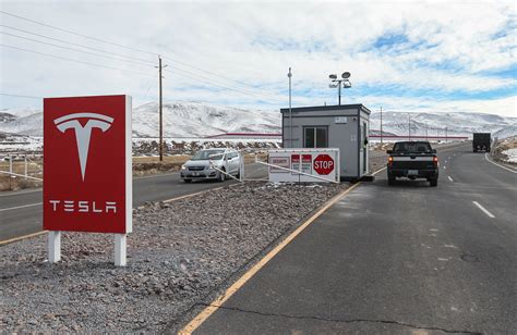 Tesla begins producing battery cells at Nevada gigafactory | Business