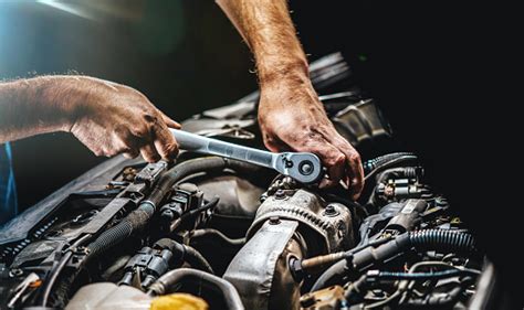 Auto Mechanic Working On Car Engine In Mechanics Garage Repair Service Authentic Closeup Shot ...