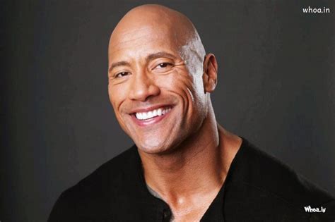 Dwayne Johnson-The Rock Dark Background With Smiley Face Closeup