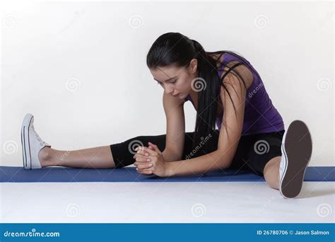 Stretching Exercises on a Mat Stock Photo - Image of athlete, enjoy: 26780706