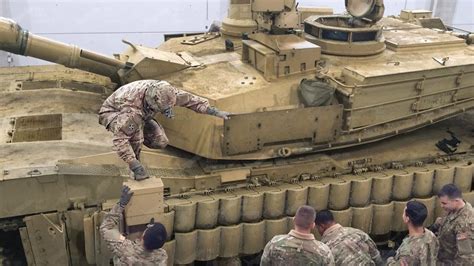 Installing Advanced Reactive Armor Plates on the Massive M1 Abrams Tank ...