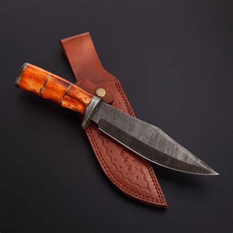 Bowie Knife // VK0077 This Bowie Knife is its own unique work of art. This material is ...