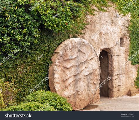 The Entrance Of A Replica Of The Tomb Where Jesus Was Buried With The Stone Rolled Away. Stock ...