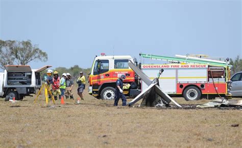 Pilot dies in Christmas party crash in front of kids | The Courier Mail