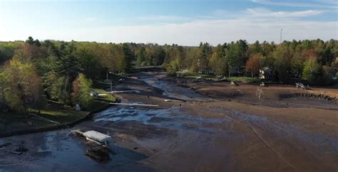 Wixom Lake Is Now A Muddy Field After Dam Failures [Video]