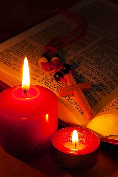 Open Bible With Cross And Burning Candles Old Red Holy Photo Background ...