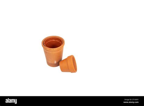 Small clay pots on white isolated background Stock Photo - Alamy