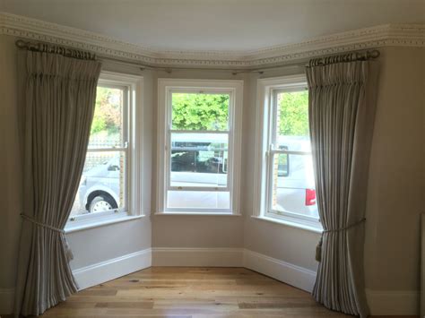 Bay Window Curtain finished using a wooden pole just fitted in a clients house. | Bay window ...