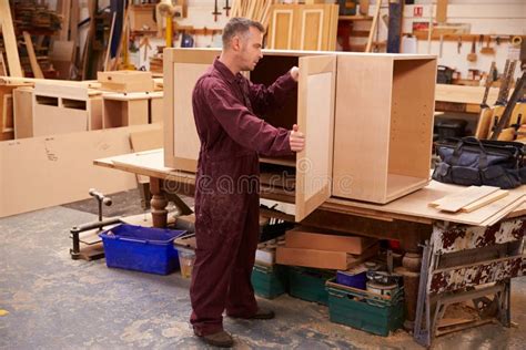 Carpenter Building Furniture in Workshop Stock Photo - Image of carpenter, joinery: 52860768