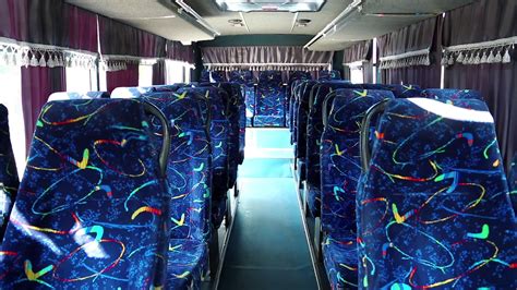 Empty interior of minibus. Bus interior with blue chair. Empty seats in bus Stock Video Footage ...