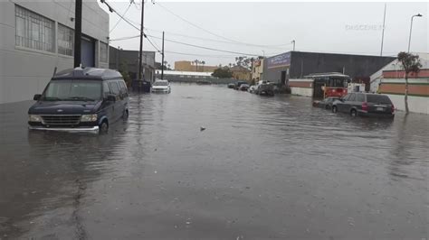 San Diego drivers left stranded in cars as flash-flooding strikes ...