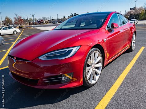 Red Tesla Model S Parked in Parking Lot Summer Day Stock Photo | Adobe ...