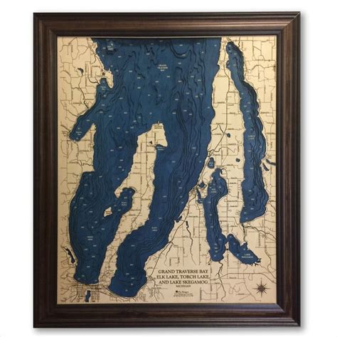 a framed map of lake michigan in blue and white with the words lake michigan on it