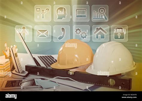 Engineering tools on office desk on background with virtual digital touchscreen Stock Photo - Alamy