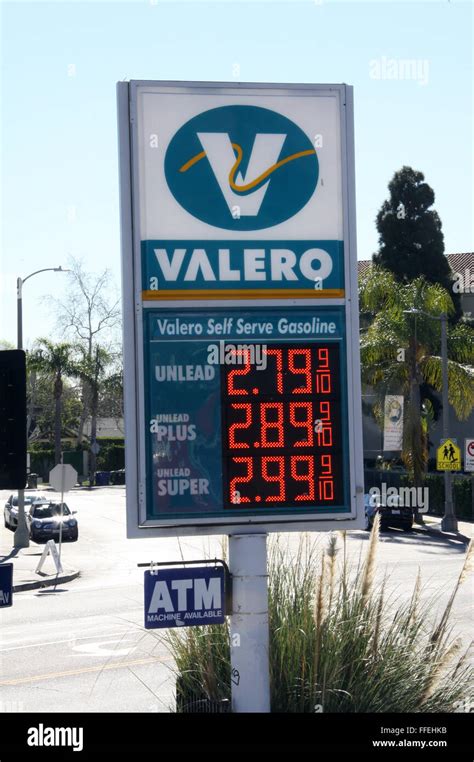 gasoline petrol and diesel fuel pump prices on display at a gas station ...