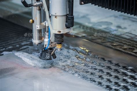 CNC water jet cutting machine Stock Photo by cookelma | PhotoDune