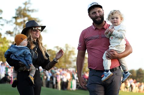 Jon Rahm kisses wife Kelley Cahill after winning 2023 Masters