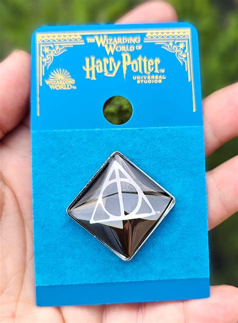 Deathly Hallows Universal Studios Resurrection Stone Pin – Hedgehogs Corner