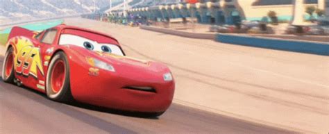 the cars are racing down the track in this animated movie