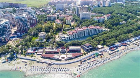 Beach of Gelendzhik Resort. Numerous Sun Umbrellas and Sun Loungers. Embankment with Balustrade ...