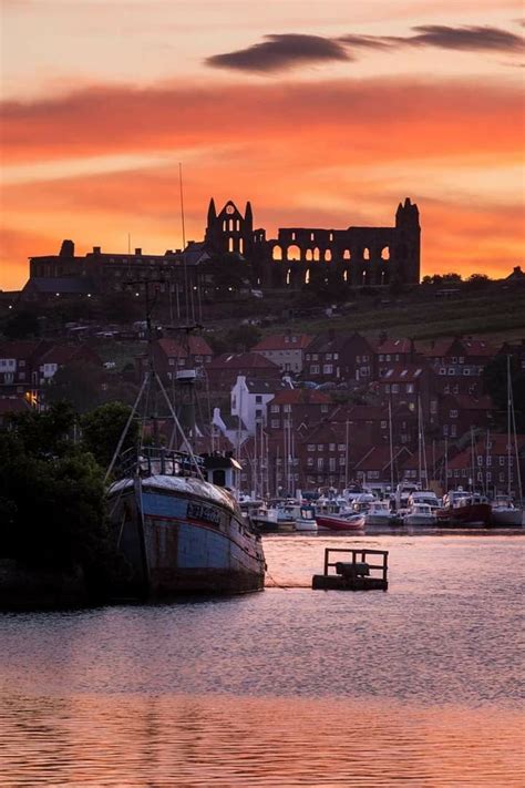 Sunset over Whitby harbour | England countryside, Whitby abbey, Wales england