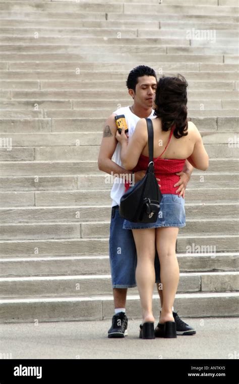 Lovers in a public display of affection Stock Photo - Alamy