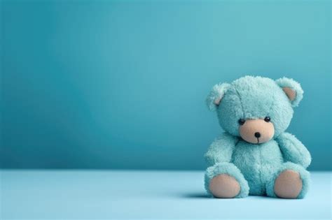 Premium Photo | A blue teddy bear sits on a blue background