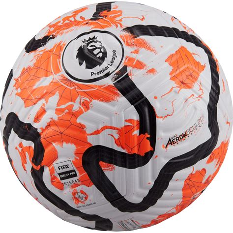 an orange and white soccer ball with black lines on the bottom, in front of a white background