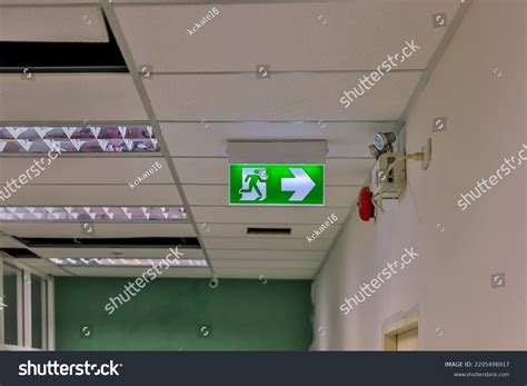 Green Emergency Exit Sign Showing Way Stock Photo 2205498917 | Shutterstock