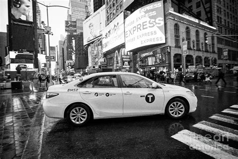 toyota camry hybrid new york yellow taxi cab crossing times square in ...