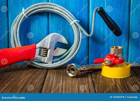 Plumbing Supplies and Tools on a Blue Wooden and Vintage Background Stock Photo - Image of ...