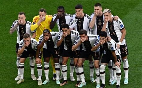 German players cover mouths to protest LGBT armband ban at World Cup ...