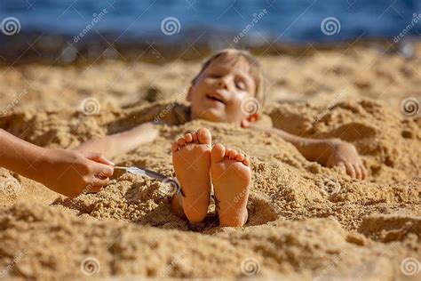 Child, Tickling Sibling on the Beach on the Feet with Feather, Kid Cover in Sand, Smiling ...