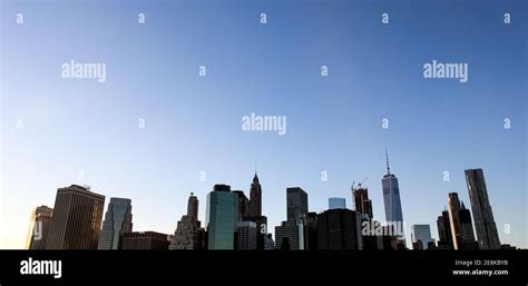 Lower Manhattan skyline view from brooklyn heights promenade at sunset ...