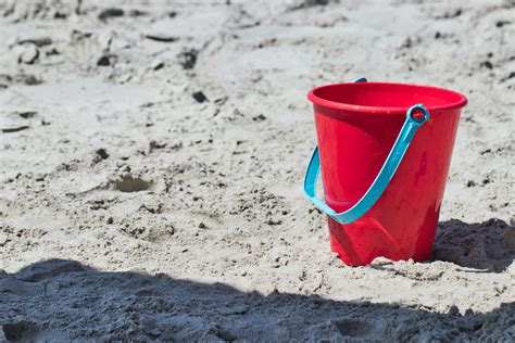 Free stock photo of beach, bucket, red