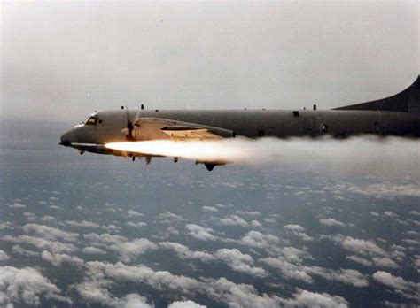 P-3 Orion launches an AIM-9 Sidewinder during tests of the air-to-air ...