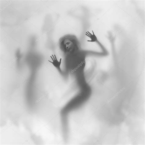 Mysterious woman silhouette, face, and shadows — Stock Photo © belphnaque #18060585