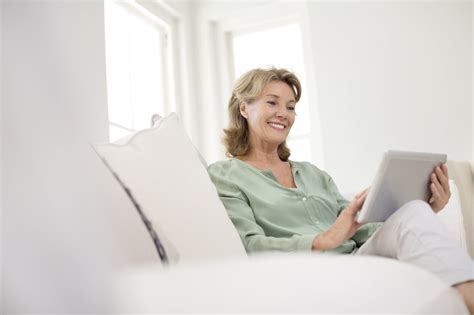 Women Laughing Alone With Tablets: New Stock Image Meme | Time