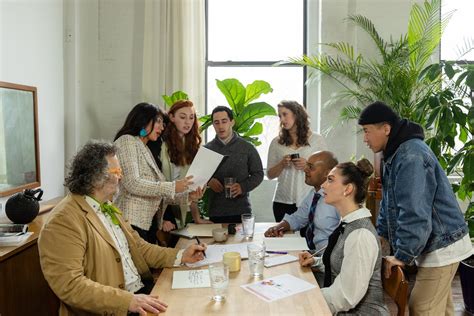 A People Working Together in Office · Free Stock Photo