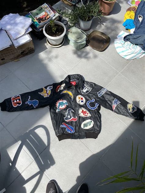 NFL Vintage nfl leather jacket all teams patches | Grailed