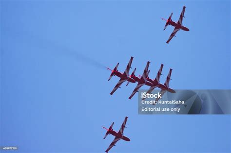 Surya Kiran Flying In Formation Stock Photo - Download Image Now - Aerobatics, Aircraft Point of ...