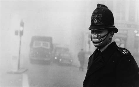 Date unknown, 1962: A policeman wears a mask for protection against the smog. | London history ...