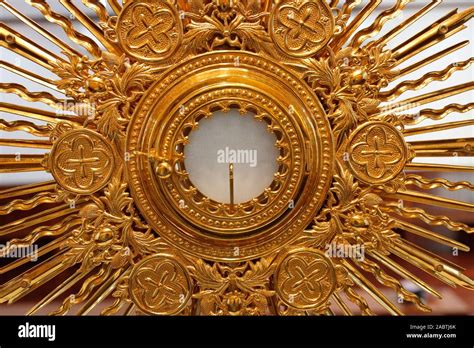 The Blessed Sacrament in a monstrance. Eucharist adoration Stock Photo ...