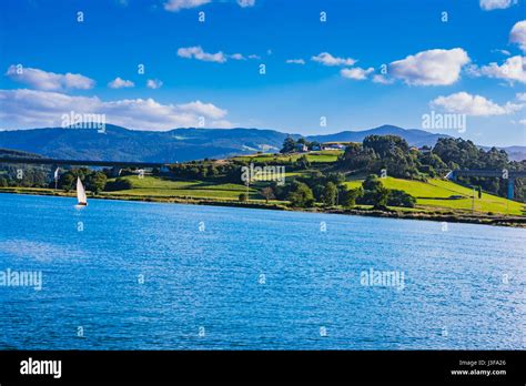 Sloop sailing the Navia river. Navia, Principality of Asturias, Spain, Europe Stock Photo - Alamy