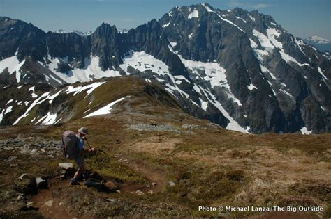 A backpacker hiking Sahale Arm, North Cascades National Park. | The Big Outside