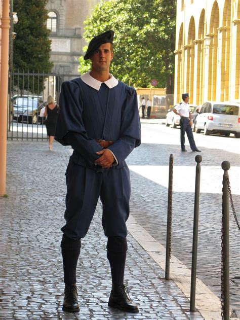 Swiss Guard in regular non-ceremonial uniform | Swiss guard, Men in uniform, Military guard