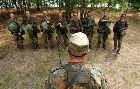 German Bundeswehr armed forces recruits of the Mechanized Infantry Battalion 411 receive a ...