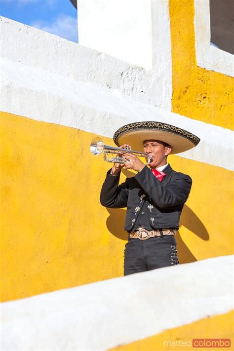 - Mariachi man playing trumpet, Izamal, Mexico | Royalty Free Image